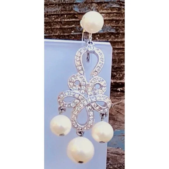 Silver Tone Bow Chandelier Clip On Earrings with Faux Pearls and Rhinestones - Picture 3 of 4